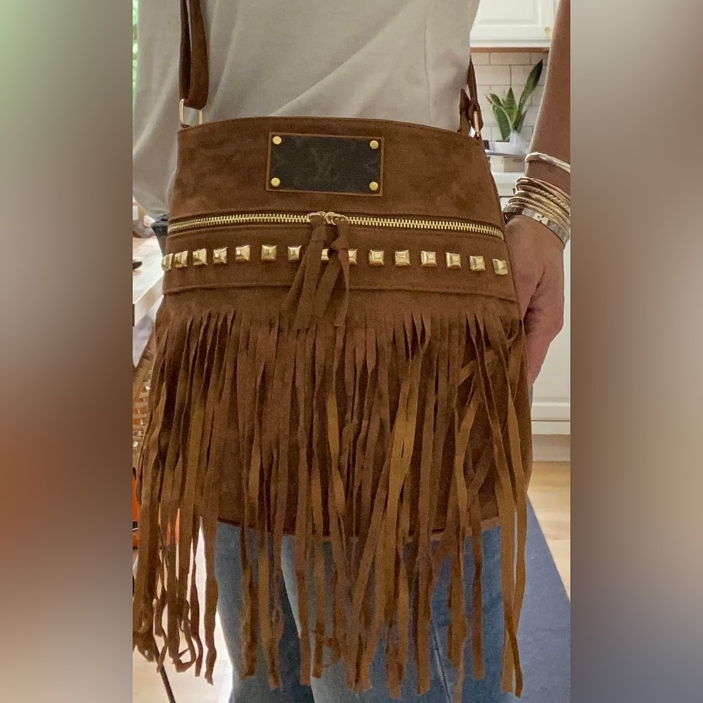 Repurposed LV suede crossbody purse.